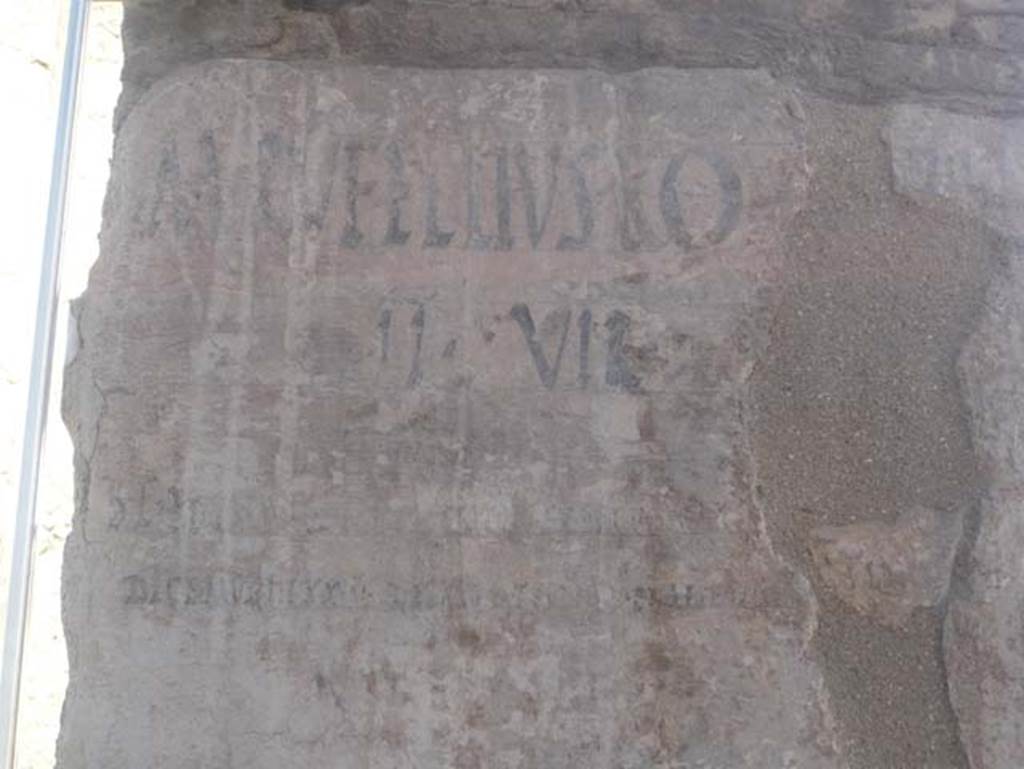 VI 12, Herculaneum, August 2013. Detail of graffiti on pilaster at north-east corner of Insula VI, adjacent to the shop at VI.12. Photo courtesy of Buzz Ferebee.